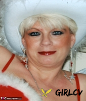 mature amateur dimonty models sexy lingerie during a christmas shoot