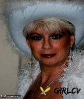 mature amateur dimonty models sexy lingerie during a christmas shoot