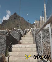 blonde girl aylin tattoo takes a piss on public steps during a sunny day 33447235