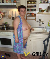 old grandma ingeborg exposes her fat body and sticks a vacuum pipe in her twat112861