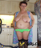 old grandma ingeborg exposes her fat body and sticks a vacuum pipe in her twat112851