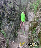 blonde chick claudia macc squats for a piss in fishnet hose while in the woods94036