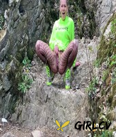 blonde chick claudia macc squats for a piss in fishnet hose while in the woods94040