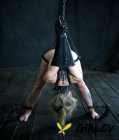 blonde chick sarah jane ceylon is restrained in a variety of ways in a dungeon246135