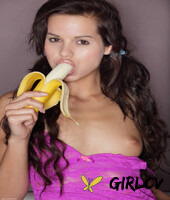 dark haired girl katka strips naked while eating a bunch of bananas182714