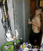 amateur girl with a nice bum stripping and posing in the mirror153627