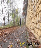white girl claudia macc takes a piss on fallen leaves near a sports park 70061399136344