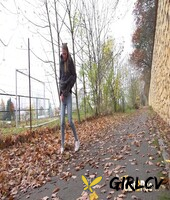 white girl claudia macc takes a piss on fallen leaves near a sports park 70061399136345