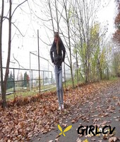 white girl claudia macc takes a piss on fallen leaves near a sports park 70061399136346