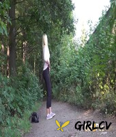 blonde girl delphine takes a pee on a dirt path near some greenery147769