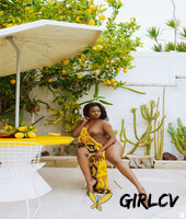 curvy ebony model aziza shows her natural tits and poses in the pool