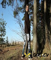 blonde girl vasya shows her bare ass while pissing next to a tree