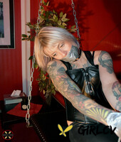 inked blonde roxxxi manson is quieted with duct tape while bound in leather162476