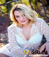 young blonde kenna james pulls down her underwear to get naked on a veranda