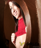 cute female in schoolgirl clothing discovers a gloryhole while masturbating198387