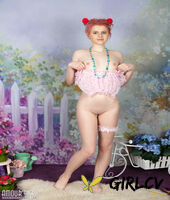 young looking girl sally gets naked while wearing a garter in puffballs137104