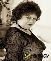 mature lady masturbates with a chicken foot while decked out for halloween238421