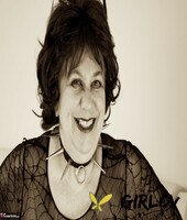 mature lady masturbates with a chicken foot while decked out for halloween238419