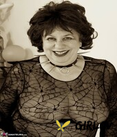 mature lady masturbates with a chicken foot while decked out for halloween238420