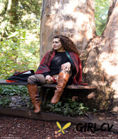 lovely chubby doll with curly hair lili toying herself in nature