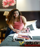 lovely chubby doll with curly hair lili toying herself in nature