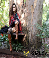 lovely chubby doll with curly hair lili toying herself in nature
