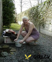 older amateur tiffany pearl gets naked while hanging laundry in a backyard 93126637