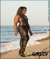 black bodybuilder jaquita person taylor flexes outside in black leather attire92883