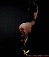 restrained brunette drools while ball gagged and popping out anal beads130626