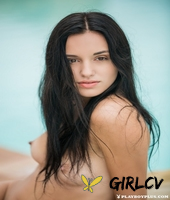 dark haired amateur sasha slips off her black bikini to pose for playboy143377