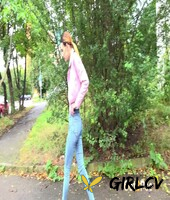 young girl adele unicorn pulls down blue jeans to pee on a set of public steps140236