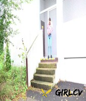 young girl adele unicorn pulls down blue jeans to pee on a set of public steps140225