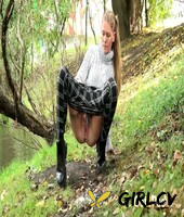 blonde girl claudia macc gets caught taking a pee next to a body of water126473
