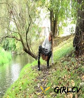 blonde girl claudia macc gets caught taking a pee next to a body of water126465