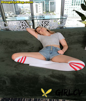 blonde teen dez hansen gets naked in a thong and over the knee socks
