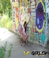tattooed redhead foxie t takes a piss in a graffitied underpass143034