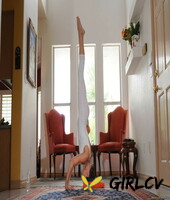 long legged brunette jenni lee stripping down naked and stretching