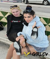 clothed females chiara and monique free their feet from footwear144929