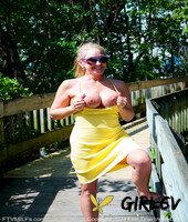 blonde lady wendy shows her round tits while going nude in the ocean133982