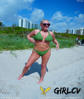 blonde lady wendy shows her round tits while going nude in the ocean133984