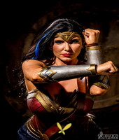 kinky milf in a wonder woman costume romi rain gets rammed by three dudes