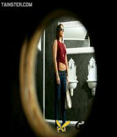 sultry brunette gets covered with jizz via a hole in the bathroom wall