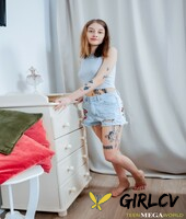 slim inked teen sasha paige reveals her body and plays with a vibrator