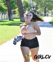 sexy black haired girl desiree rubs her twat and runs in a bra in the park169551