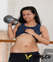 little milf julie ann strips and plays with her pussy lips during a workout