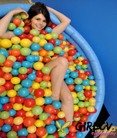 cute teen hailey immerses herself in a wading pool filed with balls145193
