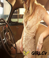 blonde classy babe ancilla tilia poses in the car with her big bosoms out90269